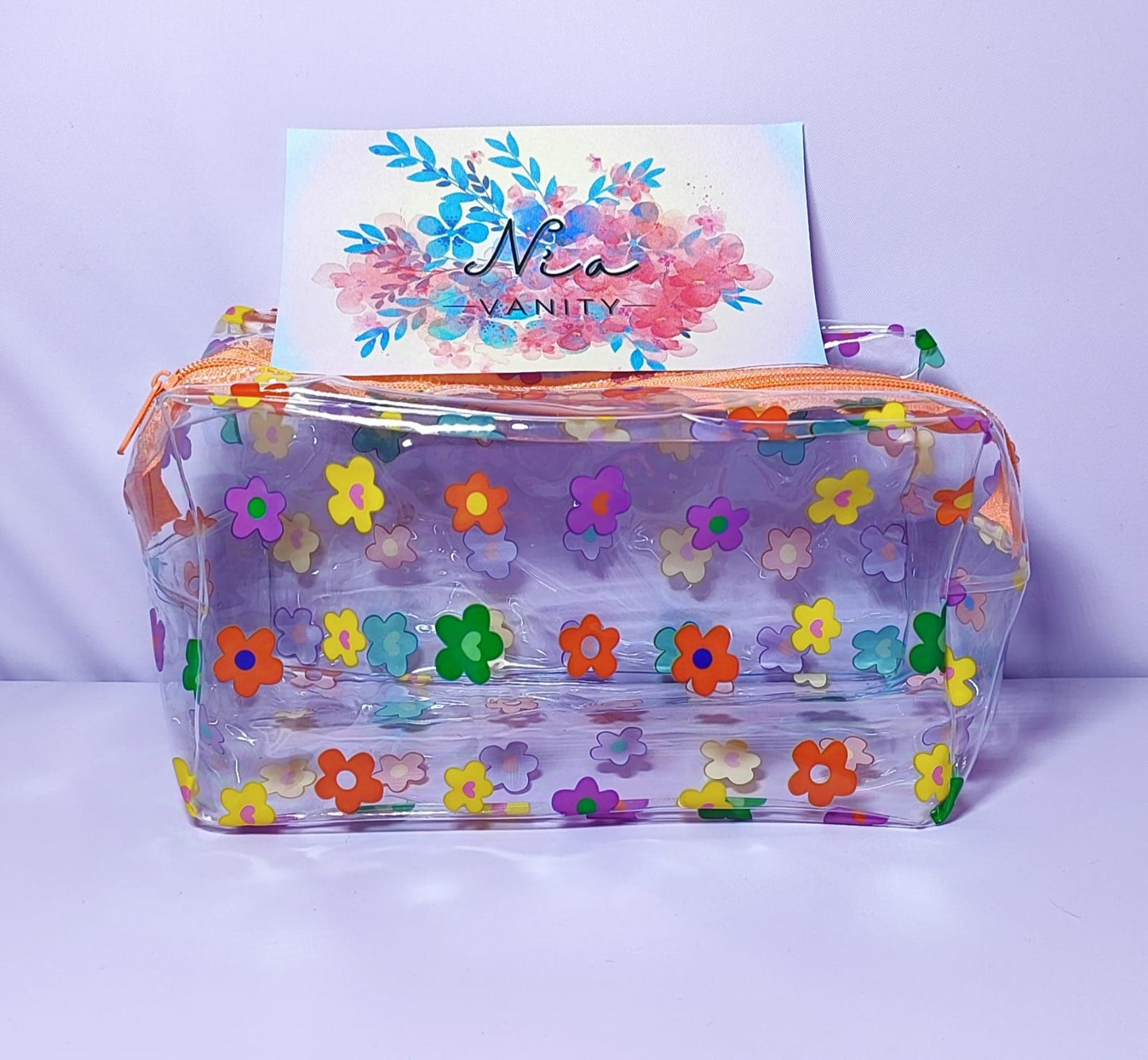 COSMETIQUERA "FLORAL CLEAR BAG"