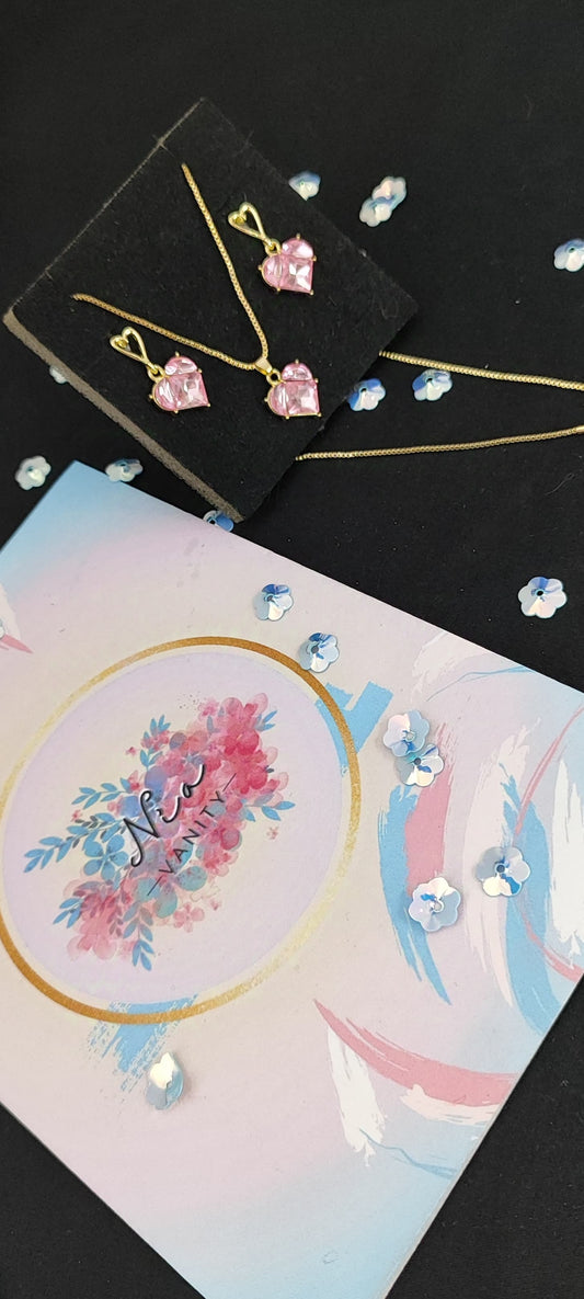 Set de collar y aretes con cristales en forma de corazón rosa – Nia Vanity